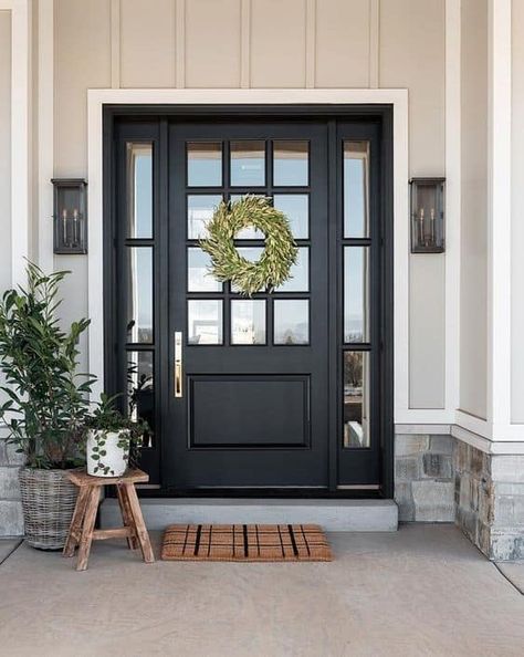 Looking for black exterior front door inspirations and ideas to increase your curb appeal and home value?  Try 22 Stunning Black Front Door Inspirations by thetarnishedjewelblog.com.  #blackfrontdoors #blackfrontdoor #frontdoorideas #blackdfrontdoorideas #modernfarmhousefrontdoorideas Decoration Hall, Black Front Door, Front Door Inspiration, Front Door Styles, Black Front Doors, Casa Country, Front Doors With Windows, Door Inspiration, Exterior Front Doors