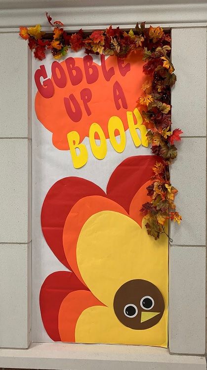 Library Thanksgiving bulletin board Gobble Up A Good Book Bulletin Board, Thanksgiving Displays For Library, Thanksgiving Library Bulletin Boards, Library Thanksgiving, Fall Library, Book Bulletin Board, Thanksgiving Bulletin Board, School Library Decor, Thanksgiving Bulletin Boards