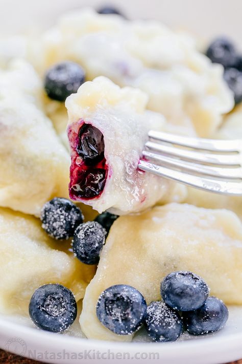 Blueberry pierogi are the ultimate comfort food. Our family has been making pierogi (vareniki) for generations. Watch this video for how to make pierogies! | natashaskitchen.com Pirogies Recipes, Blueberry Pierogi, Healthy Perogies Recipe, Cooking Perogies From Frozen, How To Make Pierogies, Pierogies Homemade, Pierogi With Farmers Cheese, Unique Pierogi Filling, Perogies Recipe