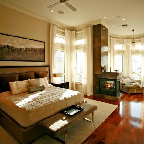 Check out this contemporary master bedroom with cherry wood floors and a cozy reading nook on HGTV.com. Cherry Wood Bedroom, Neutral Bed, Neutral Bed Linen, Cherry Wood Floors, Small Fireplace, Brown Floors, Bedroom Images, Brown Bedroom, Fireplace Surround