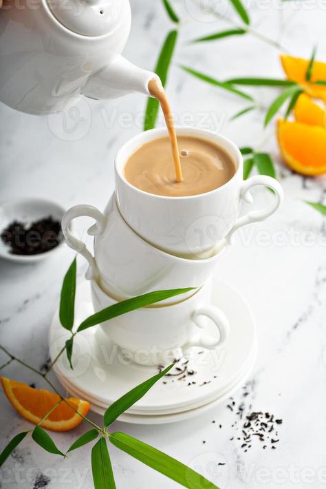 Earl grey milk tea poured in stacked cups Earl Grey Milk Tea, Tea Photo, Earl Gray, Earl Grey, Milk Tea, Milk, Tea, Grey