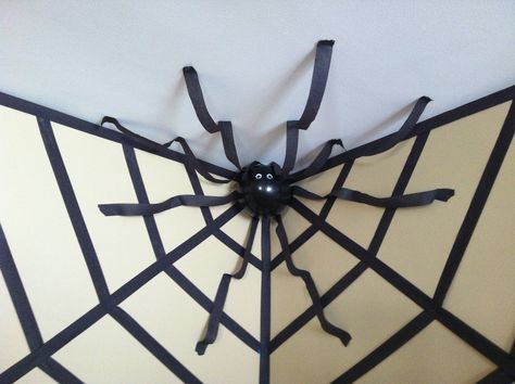 Halloween decor- giant spider in a web using streamers and a balloon Funny Mens Halloween Costumes, Halloween Decorations Spiders, Halloween Streamers, Easy Outdoor Halloween Decorations, Spiderman Decorations, Halloween Office Party, Office Halloween Decorations, Office Halloween, Spider Web Decoration