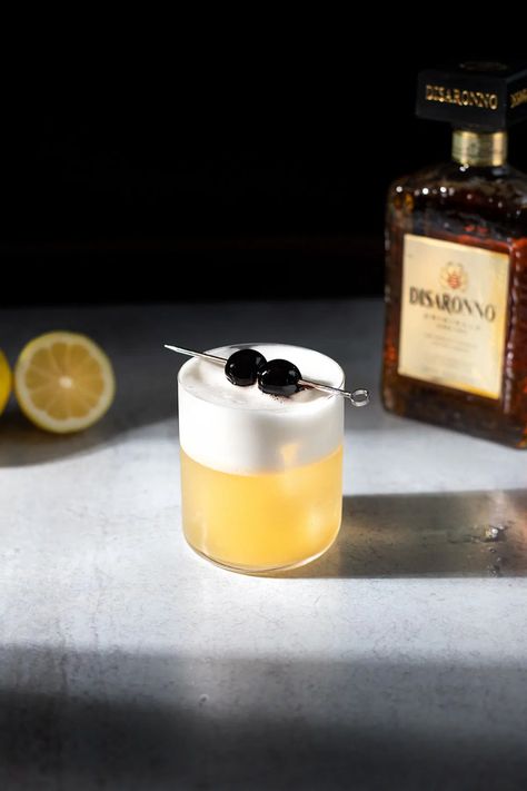 Amaretto Sour - Moody Mixologist Amaretto Sour Aesthetic, Amaretto Aesthetic, Mixologist Aesthetic, Ameretto Sour, Moody Mixologist, Cocktail Amaretto, Amaretto Sour Recipe, Amaretto Drinks, Amaretto Sour Cocktail