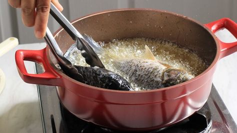 The Right Way To Reuse Oil After Deep Frying Fish — Chowhound Fish Fry Seasoning, Frying Fish, British Fish And Chips, Fried Fish Tacos, Fish N Chips Recipe, Hush Puppies Recipe, Authentic Chinese Recipes, Deep Fried Food, Deep Frying