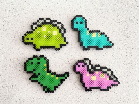 Aesthetic Perler Beads, Dinosaur Pixel, Light Green Plain, Perler Beads Art, Melty Bead Designs, Melt Beads Patterns, Hamma Beads Ideas, Easy Perler Bead Patterns, Keychain Phone