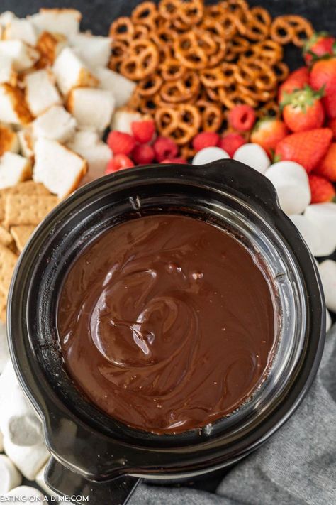 Crock Pot Chocolate Fondue - Eating on a Dime Fruit Fondue, Chocolate Fondue Charcuterie Board, Crock Pot Chocolate Fondue, Crockpot Fondue Chocolate, Easy Chocolate Fondue Recipe Crockpot, What To Dip In Chocolate Fondue, Fondue Dippers Chocolate, Diy Chocolate Fondue Pot, Fondue Party Chocolate