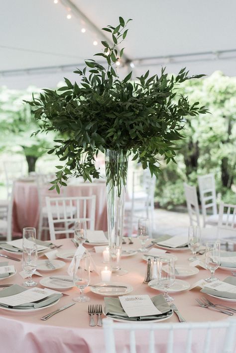 Tall Glass Floral Centerpieces, Tall Vase With Greenery, Green Foliage Centerpieces, Tall Eucalyptus Centerpiece, Greenery And White Flowers Centerpieces, Glass Bottles Wedding Centerpieces, Green And White Flower Arrangements Tall Centerpiece, Greenery Only Centerpiece, Pilsner Vase Centerpiece Wedding