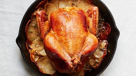 Cast-Iron Roast Chicken With Crispy Potatoes Cast Iron Roasted Chicken, Tiny Potato, Gluten Free Potatoes, Dark Meat, Stuffed Whole Chicken, Chicken Potatoes, Crispy Potatoes, Cast Iron Skillet, Chicken Flavors