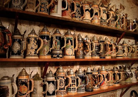 Collected from every imaginable corner of Germany, our bar is now fully stocked with these beautiful authentic beer steins! Adorned in a... Beer Stein Display, Beer Display, Paris Walking Tour, Paris Market, Beer Pictures, Paris Markets, I Like Beer, Beer 101, Mug Display