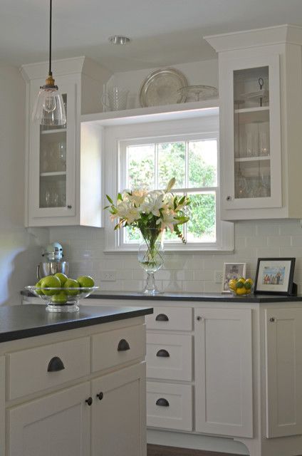 My Houzz: Elegant Updates for a Traditional Dallas House Kitchen Sink Window Decor, Kitchen Window Shelf, Kitchen Window Shelves, Sink Window, Kitchen Window Blinds, Above Kitchen Sink, Kitchen Sink Window, Kitchen Wall Shelves, Window Shelves