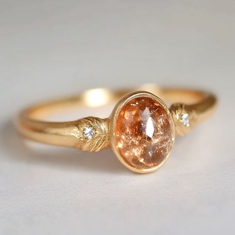 Golden dawn 🌅 working on pieces for fall vibes🍁 #fallvibe #giftforher #jewelrygift #goldring #orangesunstonering #uniquejewelry #uniquering #sunstonering Orange Gemstone Ring, Orange Engagement Ring, Unique Gold Engagement Rings, Orange Gemstones, Sunstone Engagement Ring, Ring Gold Engagement, Crystal Engagement Rings, Engagement Ring Gold, Sunstone Jewelry