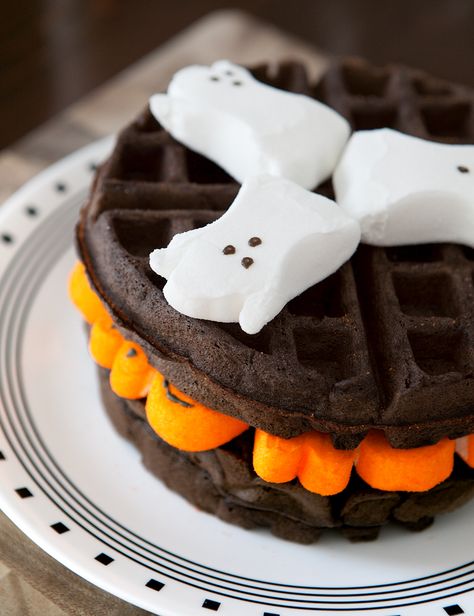 Dark Chocolate Marshmallow Halloween Waffles - these sinful waffles have whipped egg whites folded into the batter to keep them light. They're not too sweet and the sugary melted Peeps marshmallows add just enough sweetness to balance out the bold dark chocolate. Plus, they are SO cute for Halloween or any holiday (just use seasonal Peeps!) Halloween Waffles, Marshmallow Halloween, Waffle Ideas, Halloween Breakfast, Chocolate Marshmallow, Halloween Chocolate, Brownie Bites, Chocolate Marshmallows, Halloween Snacks