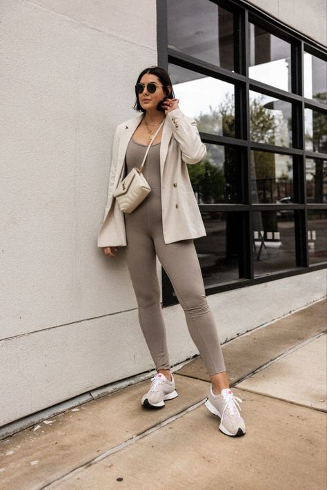 Wearing an active jumpsuit from Dynamite for an easy pulled together spring outfit. worn with an oversized blazer and new balance sneakers Romper With Blazer Outfits, Active Jumpsuit Outfit, Romper With Blazer, Blazer And Sneakers Outfit, Amazon Wardrobe, Blazer Jumpsuit, Athleisure Jumpsuit, Beige Jumpsuit, Kendi Everyday