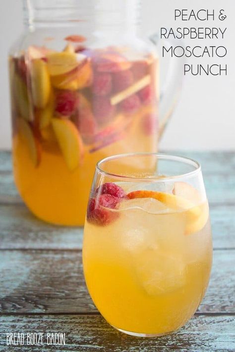 Peach Raspberry Moscato Punch Moscato Drinks, Wine Punch Recipes, Moscato Punch, Peach Moscato, Moscato Sangria, Wine Punch, Bread Booze Bacon, Alcoholic Punch Recipes, Peach Wine