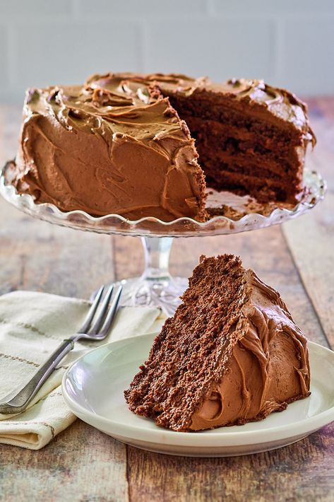 Chocolate Mousse Cake combines layers of moist and fluffy chocolate cake spread with smooth and creamy chocolate mousse. Then the cake is covered in a perfect chocolate buttercream frosting for the ultimate intensity of chocolate in every bite. Easy Chocolate Mousse Cake, Chocolate Mousse Frosting, Mousse Frosting, Cake Recipe From Scratch, Fluffy Chocolate Cake, Chocolate Mousse Cake Recipe, Easy Chocolate Mousse, Mousse Cake Recipe, Layer Cake Recipes