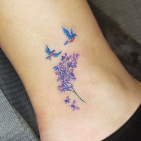 Blue birds and lilacs ❤ Lilac And Bird Tattoo, Chickadee And Lilac Tattoo, Bluebird Tattoo Meaning, Plumeria Tatoos, Blue Bird Tattoos For Women, Simple Lilac Tattoo, Blue Bird Tattoo, Colorful Bird Tattoos, Tribute Tattoo