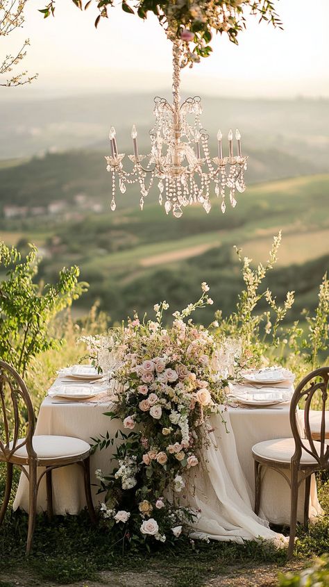 Capture the magic of an enchanting Italian countryside wedding decor with romantic elegance! Imagine soft ivory linens and wildflowers illuminated by golden sunset light. Let us film your love story! 🌿✨ #ItalianWedding #RomanticElegance #WeddingVideographer #Midjourney Italian Countryside Wedding, Ultimate Playlist, Barcelona Wedding, Wedding Spain, Sunset Light, Golden Sunset, Italian Countryside, Countryside Wedding, Beautiful Perfume