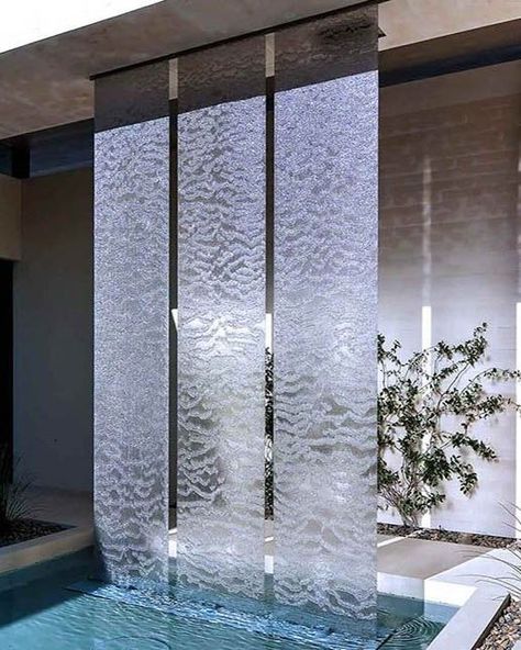 Glass Waterfall Wall Indoor, Waterfall Interior Design, Indoor Fountain Ideas Living Rooms, Glass Water Fountain, Indoor Fountain Ideas, Water Fountains Indoor, Waterfall Indoor, Indoor Waterfall Wall, Homemade Water Fountains