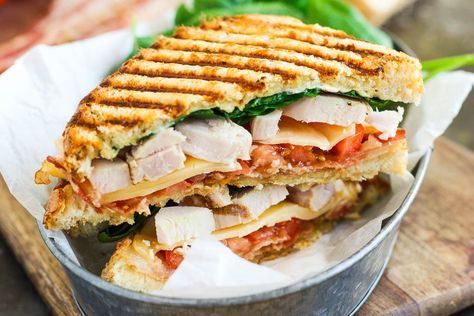 This Chicken Bacon Ranch Panini is fast, fresh, and ready in no time. Loaded with tender chunks of chicken, crisp bacon, fresh spinach, Havarti cheese, and a garlic ranch dressing, this sandwich is packed with flavor and makes the perfect, easy meal! Chicken Bacon Ranch Panini, Garlic Ranch Dressing, Chicken Pesto Panini, Turkey Panini, Garlic Ranch, Chicken Panini, Panini Recipes, Panini Sandwiches, Havarti Cheese