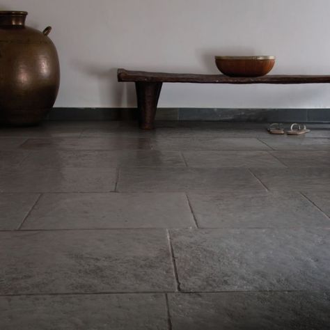 Ideal for your indoor flooring or outdoor patio. 'The Heritage collection' gives textures and colour tones that display a time-worn traditional stone. The mid-dark grey tones of Pewter Limestone create a classic look perfect for both a contemporary and traditional design with a tumbled, brushed finish and cushioned antiqued edges. #flooring #stonefloor #tiles #rustic #floortiles #flooringideas #floorinspo Stone Floor Texture, Dark Tile Floors, Limestone Floor, Limestone Floor Tiles, Slate Patio, Mudroom Flooring, Outdoor Porcelain Tile, Entry Tile, Black Floor Tiles