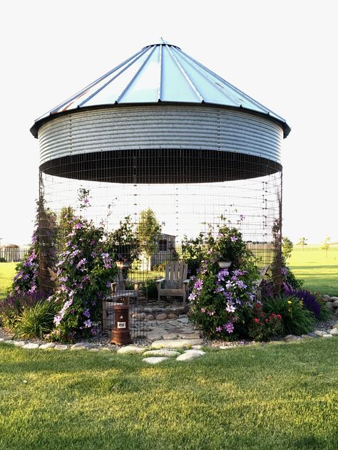 Old Corn Crib Ideas, Corn Crib Aviary, Grain Bin Greenhouse, Old Silo Ideas, Silo Greenhouse, Grain Bin Fire Pit, Corn Crib Gazebo Ideas, Corn Crib Ideas, Gazebo And Fire Pit