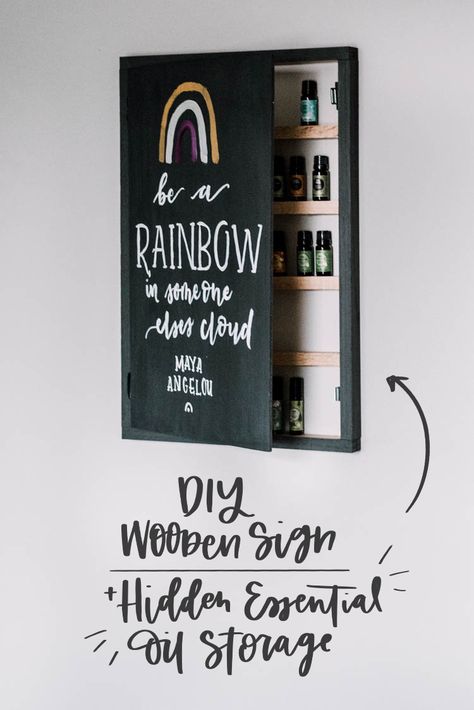 LOVE THIS! Such a clever use of space. DIY Hidden Essential Oils Storage- Wood Sign! #DIY #EssentalOils #Storage #Art #WoodenSign Diy Wooden Sign, Wood Sign Diy, Essential Oils Storage, Free Building Plans, Essential Oils Collection, Diy Blanket Ladder, Wooden Signs Diy, Essential Oil Storage, Oil Storage