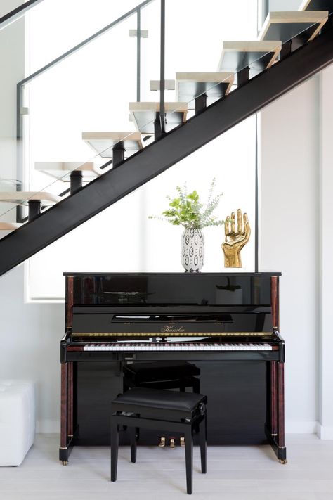 20 Room Designs with a Piano | HGTV Piano Stairs, Piano Living Rooms, Space Under Stairs, تحت الدرج, Piano Decor, Interior Design Plan, Piano Room, Wooden Wall Panels, Bungalow Design