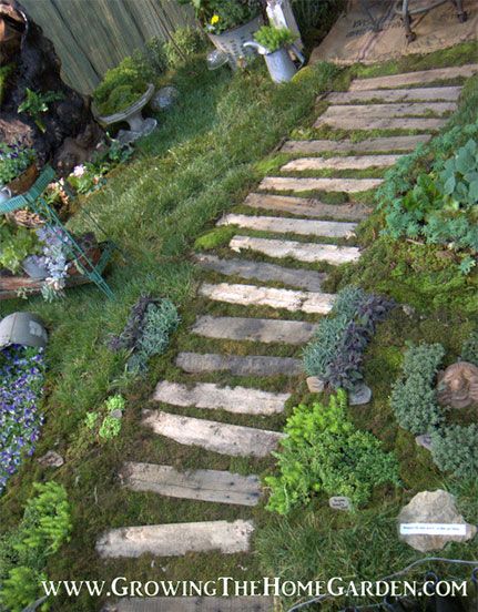 pathway made from recycled material | Another simple pallet path, via Growing the Home Garden Pallet Path, Pallet Walkway, Wood Pathway, Pathway Ideas, Wood Walkway, Pathway Landscaping, Garden Walkway, Stone Path, Pallet Garden