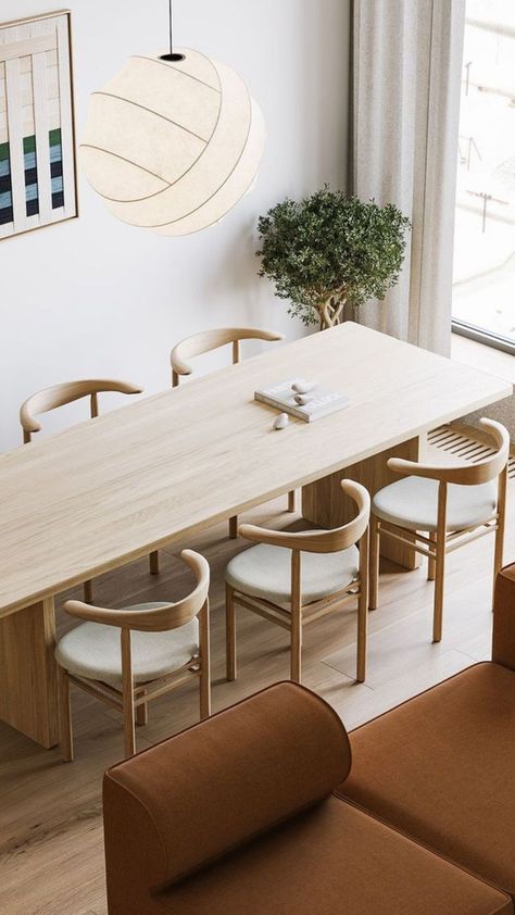 In our fast-paced world, where clarity and simplicity are prized, the modern minimalist dining table has become a staple in homes striving for a serene and uncluttered environment. These tables embody the philosophy of “less is more,” offering clean lines and understated designs that stand the test of time. For more inspiration, visit our website. Scandinavian Interior Dining, Scandinavian Interior Dining Room, Small Living And Dining Room Ideas, Lamp Over Dining Table, Dining Table Minimalist, Minimal Dining Table, Japandi Dining Room Design, Modern Minimalist Dining Table, Japandi Dining Room