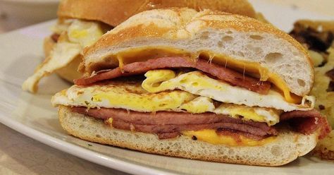 The pork roll is New Jersey's answer to the perfect breakfast sandwich to kick off the day. Whether you call it pork roll or Taylor Ham, New Jerseyans are unanimous in their love for this sandwich. Taylor Pork Roll, Taylor Ham, Rolled Sandwiches, Pork Roll, Delicious Sandwiches, Work Lunch, Easy Casserole Recipes, Entree Recipes, Cured Meats