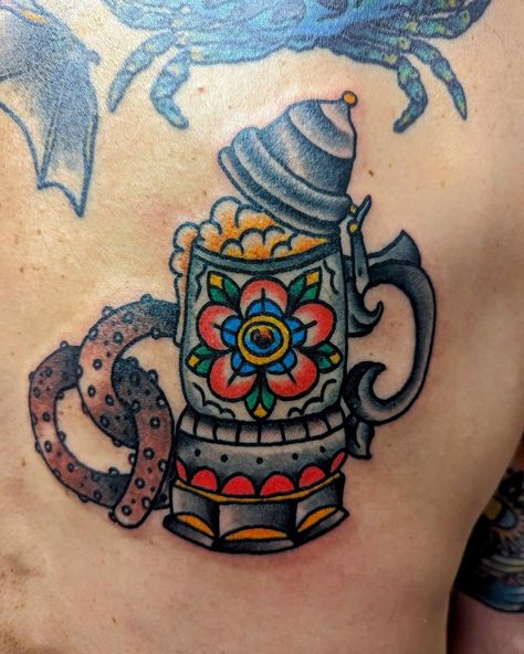 Beer stein and pretzel tattoo by Brendan Poblocki. #12ozstudios #team12oz #tattoo #tattoos #tattooed #tattooing #tattooism #tattooart #tattooartist #tattooer #tattooist #art #artstudio #tattooshop #tattoostudio #ink #inked #traditionaltattoos #tattooflash #beerstein #bavarian #octoberfest #beer #craftbeer German Traditional Tattoo, German Stein Tattoo, German Style Tattoo, Beer Stein Tattoo, American Traditional Beer Tattoo, Pretzel Tattoo, German Beer Stein Tattoo, German Tattoo, Octoberfest Beer