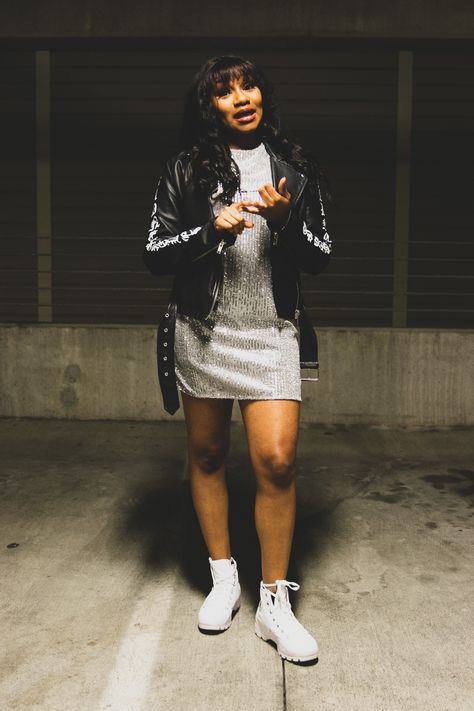 Silver sequin dress. White converse. Moto Jacket. Short Dress. Casual shiny outfit. Parking Garage Photography. Sequin Dress And Sneakers, Garage Photography, Sequin Dress White, Short Dress Casual, Silver Sequin Dress, Outfits With Converse, White Converse, Shiny Clothes, Parking Garage