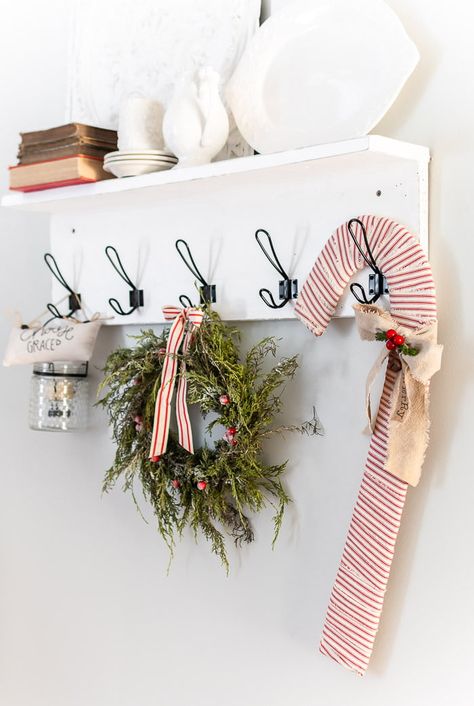 DIY candy canes Wreath Shelf, Cottage Christmas Bedroom, Diy Candy Canes, Gingerbread Trees, Giant Candy Cane, Candy Cane Candle, Candy Pillows, Canes Decor, Black Hooks