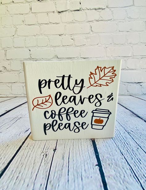 "Pretty leaves , coffee please.  Fall such a wonderful time of the year.  Curling up with a warm blanket and a warm cup of coffee is just perfect. And decorating your Coffee station for the season is easy with the adorable sign This fall coffee wood sign is a perfect addition to any tiered tray, display on a coffe table, mantel, coffee bar, etc. The sign measures 5.5\"x5.5\" This sign has been painted with white chalk paint. Letters are permanent vinyl. Please note, this item is handmade and han Fall Kitchen Signs, Fall Coffee Bar Signs, Fall Cafe Decor, Thanksgiving Coffee Quotes, Fall Coffee Quotes, Coffee Bar Sign Ideas, Fall Coffee Bar Ideas, Fall Coffee Station, Bar Chalkboard Ideas