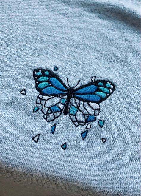 blue butterfly embroidery design on grey sweatshirt Cute Embroidery Tshirt, Blue Butterfly Clothes, Blue Shirt Embroidery, Embroidery Designs On Hoodies, Embroidery Designs On Sweatshirts, Tshirt Embroidery Diy, Embroidery Patterns Butterfly, Embroidery Designs Tshirt, Aesthetic Embroidery Designs