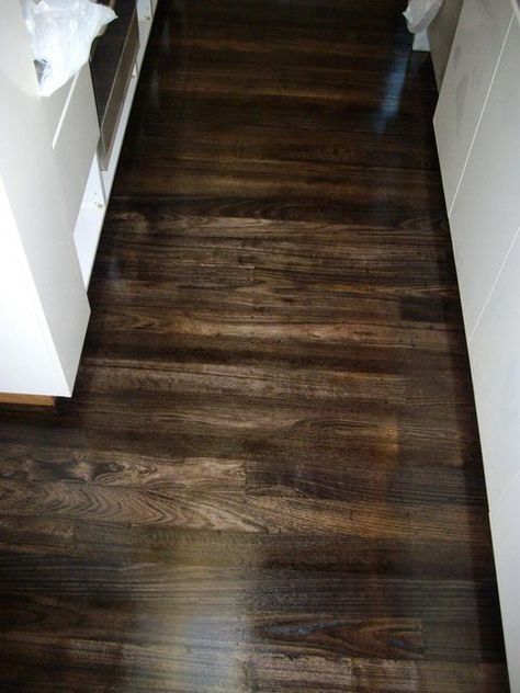 Chocolate Brown stained floor.  Beautiful! Chocolate Wood Floors, Chocolate Brown Floors, Chocolate Brown Flooring, Mid Tone Brown Wood Floors, Dark Brown Wood Tile Floors, Dark Brown Vinyl Flooring, Interior Cladding, Floor Stain, Brown Floors