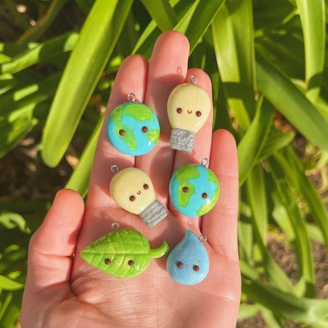 Hannah,Polymer Clay Enthusiast on Instagram: “🍃💡Catching up on all my late Earth Day creation posts🌎💧 I made some of these charms on my livestream which was SO FUN if you ever want to…” Novelty Polymer Clay Dangle Jewelry, Dino Clay Earrings, Teapot Polymer Clay Earrings, Clay Hanging Plant Earring, Polymer Clay Plant Pot Earrings, Earth Clay, Clay Jewelry Diy, Clay Charms, Earth Day