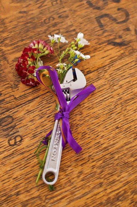 Adding a personal touch to Jake's #boutonniere #wrench #mechanic Wrench Boutonniere, Wrench With Flowers Tattoo, Mechanic Boutonniere, Mechanic Wedding Ideas, Sparkplug Boutineer, Steampunk Boutonniere, Bike Wedding, Gettin Hitched, Boutonniere