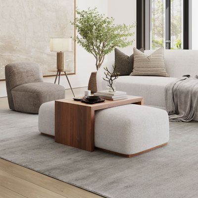 Elevate your living space with the Bennington Sliding Ottoman. Crafted with plush ivory boucle fabric and a sleek wood base, this 48" ottoman exudes modern luxury. Its deep cushioning invites you to sink in, offering both comfort and style. What sets it apart? Caster wheels ensure effortless mobility, allowing you to adapt your space with ease. But here's the ingenious twist: included is a 30" wooden coffee table top that effortlessly slides over, transforming it into a chic coffee table. This v Chic Coffee Table, Coffee Table Top, Ottoman Coffee, Caster Wheels, Inspire Me Home Decor, Ottoman Coffee Table, Ottoman Table, Wooden Coffee Table, Patio Furniture For Sale