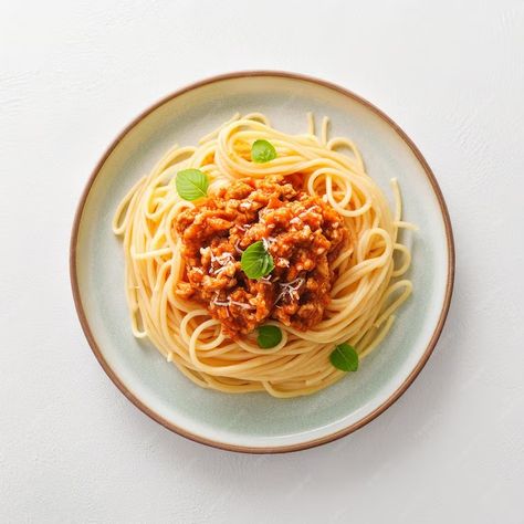 Premium Photo | Spaghetti Bolognese Top View on White Background Pasta Dish Pasta Dishes Photography, Food Photography White Background, Spaghetti Photography, Rigatoni Alla Norma, Pasta Png, Bolognese Spaghetti, Food Top View, Pasta Photo, Bolognese Pasta