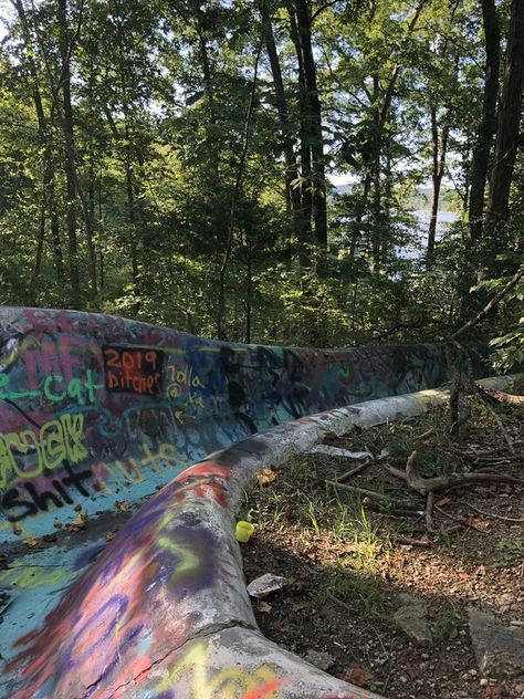 Tucked away in the forests of Indiana resides an abandoned waterslide that is now a popular graffiti haunt. Bloomington Indiana, Atlas Obscura, Crystal Castle, Street Graffiti, Summer Bucket, Abandoned Buildings, Abandoned Houses, Love Photos, Pretty Places