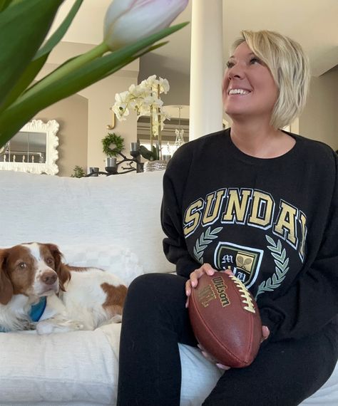 Super Bowl Sunday 🏈 with my 🐶. The Sunday Social Club Sweatshirt is oversized and the perfect cozy vibe when your own team isn’t on the field. Are you here for: 1. The game (which team)? 2. The commercials? 3. Halftime? 4. The snacks? Comment below with your answer(s) and be entered to win a $25 gift card! Team 2, Super Bowl Sunday, Club Sweatshirts, Social Club, Super Bowl, Sweatshirts