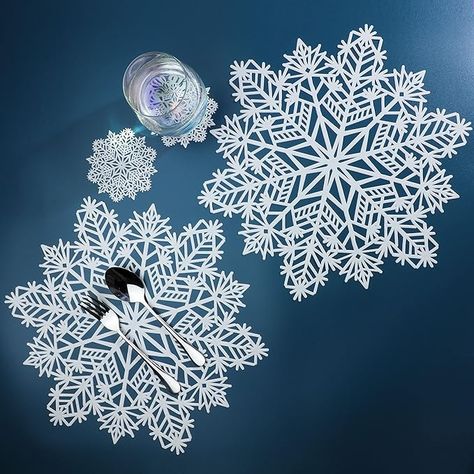 Amazon.com: Snowflake Placemats Set of 6 Laminated Metallic Vinyl Round 15 inch Diameter Winter Festival Table Decorations for Holiday Christmas Party Feast Come w/Matching Coaster by Snowkingdom (White, 12 pcs) : Home & Kitchen Festival Table Decorations, Snowflake Placemats, Festival Table, Holiday Dining Table, Holiday Christmas Party, Crochet Snowflakes, Winter Festival, Holiday Dining, White Snowflake