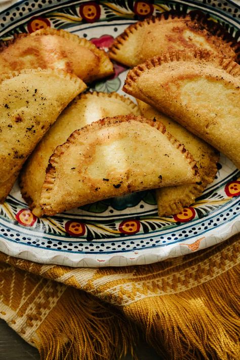 Tender handheld corn pastry pockets are filled with spicy, smoky shredded chicken in my favorite Molotes Recipe. These freezer-friendly Oaxacan Masa Empanadas are an utter delight filled with my slow-cooked chicken tinga, but you're welcome to use any meats, veggies, or cheeses you prefer. Perfect for entertaining, especially as Christmas, Hannukah, or New Year's Eve appetizers! Corn Tortillas Tacos, Empanadas Recipe Dough, Bueno Recipes, Chicken Tinga, Chorizo And Potato, New Year's Eve Appetizers, Latin Recipes, Slow Cooked Chicken, Empanadas Recipe