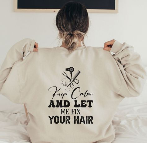 32.25 USD Hair Stylist Sweatshirts Hoodies Crewneck Hooded For Women Cosmetology Plus Size Hoodie Shirts Beautician Hairstylist Gifts for Her Introducing our Hair Stylist Sweatshirt - the perfect addition to any cosmetologist or hairstylist's wardrobe! This comfortable and stylish sweatshirt features a fun and playful message on the back that reads "Keep Calm and Let Me Cut Your Hair." Crafted with high-quality materials, this sweatshirt is not only stylish but also comfortable to wear. The… Hair Message, Hairstylist Gifts, Handyman Shirt, Esthetician Marketing, Plus Size Hoodie, Funny Gifts For Him, Cozy Fabric, Cosmetology, Boys Shirts