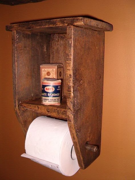 toilet paper holder with display shelf Primitive Bathrooms Decorating, Primitive Shelves, Primitive Bathroom, Booth Diy, Over Toilet Storage, Sunflower Head, Primitive Bathrooms, Over Toilet, Diy Holder