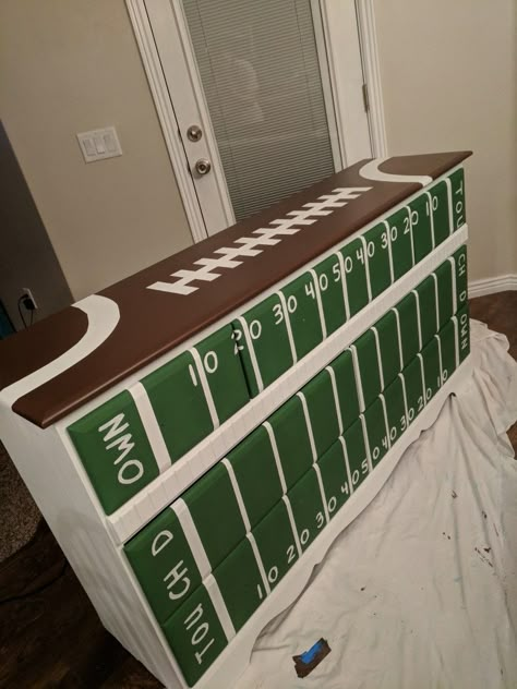 Football dresser Football Headboard Ideas, Soccer Dresser Diy, Nfl Bedroom Ideas, Football Room Ideas For Boys, Boys Football Room Ideas, Football Themed Room, Football Room Decor, Football Nursery, Trip Room