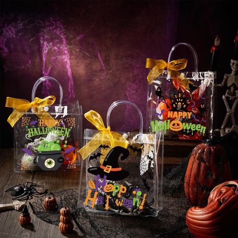 Paterr 50 Pcs Halloween Clear Gift Bags Trick or Treat Clear Plastic Gift Bags with Handle 4 Styles Halloween Goodie Bags with Ribbon for Halloween Party Supplies, 7.87 x 3.15 x 7.87 inches Halloween Gift Bag Ideas, Halloween Doorstep, Halloween Goodie Bag Ideas, Clear Gift Bags, Halloween Gift Bags, Halloween Goodie Bags, Plastic Gift Bags, Loot Bags, Halloween Party Supplies