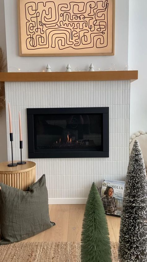 Winter and christmas mantel decor in scandinavian style house with wood mantle and white tile fireplace. White oak floors. White Tile Fireplace, Scandinavian Style House, Simple Winter Decor, Great Room Remodel, Fireplace White, Christmas Scandinavian, Modern Japandi, Christmas Mantel Decor, Wood Mantle