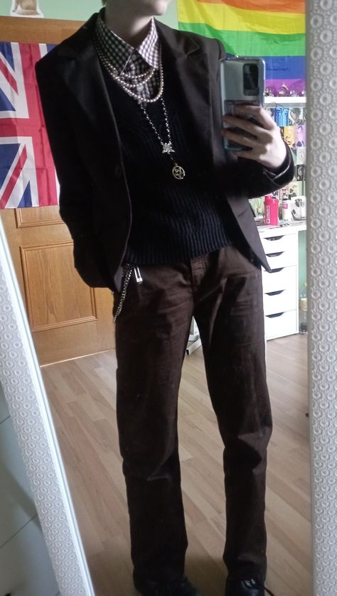 boy wearing brown pants, brown collared shirt, black sweater vest, brown blazer and pearl jewelry Punk Sweater Vest, Mens Alt Fashion Formal, Gothic Fashion Men Casual, Fancy Punk Outfits, Preppy Outfits Male, Male Vest Outfit, Alternative Male Fashion, Dark Academia Male Outfit, Gothic Male Fashion